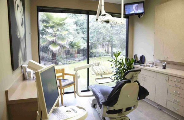 patient room with TV inside the Fawcett Center for Dentistry office